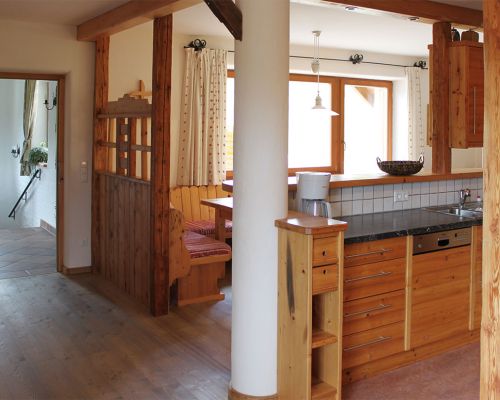seating accommodation and kitchen in the holiday home
